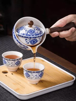 Unique Ceramic Moving Teapot Filter Set